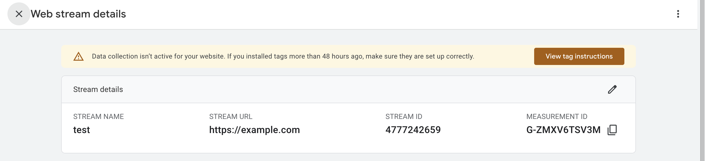 A screenshot of the Google Analytics interface showing the location of the MEASUREMENT ID.